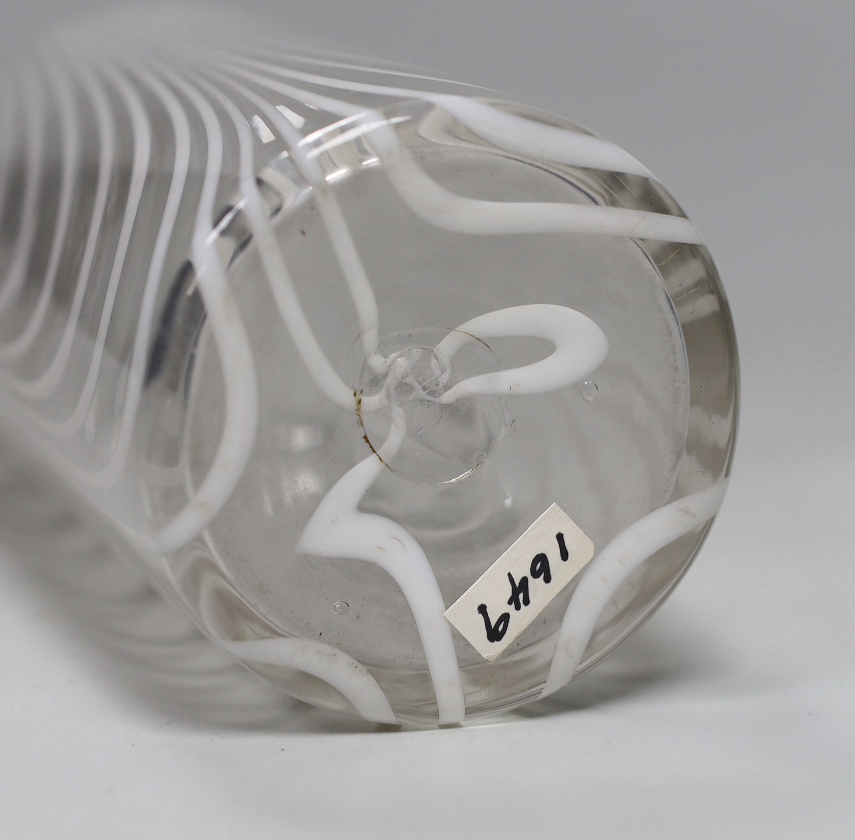 A 19th century Nailsea bottle vase, c1840-50, of long necked form with white combed decoration, three applied neck rings and rough pontil, 33cm high